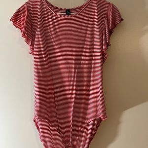 Red and white striped body suit .